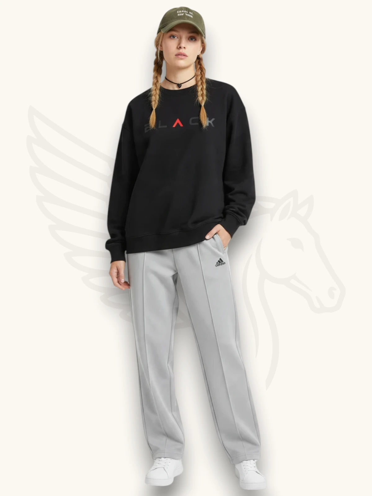 Black sweatshirt and light gray trouser tracksuit set on a female model, full outfit