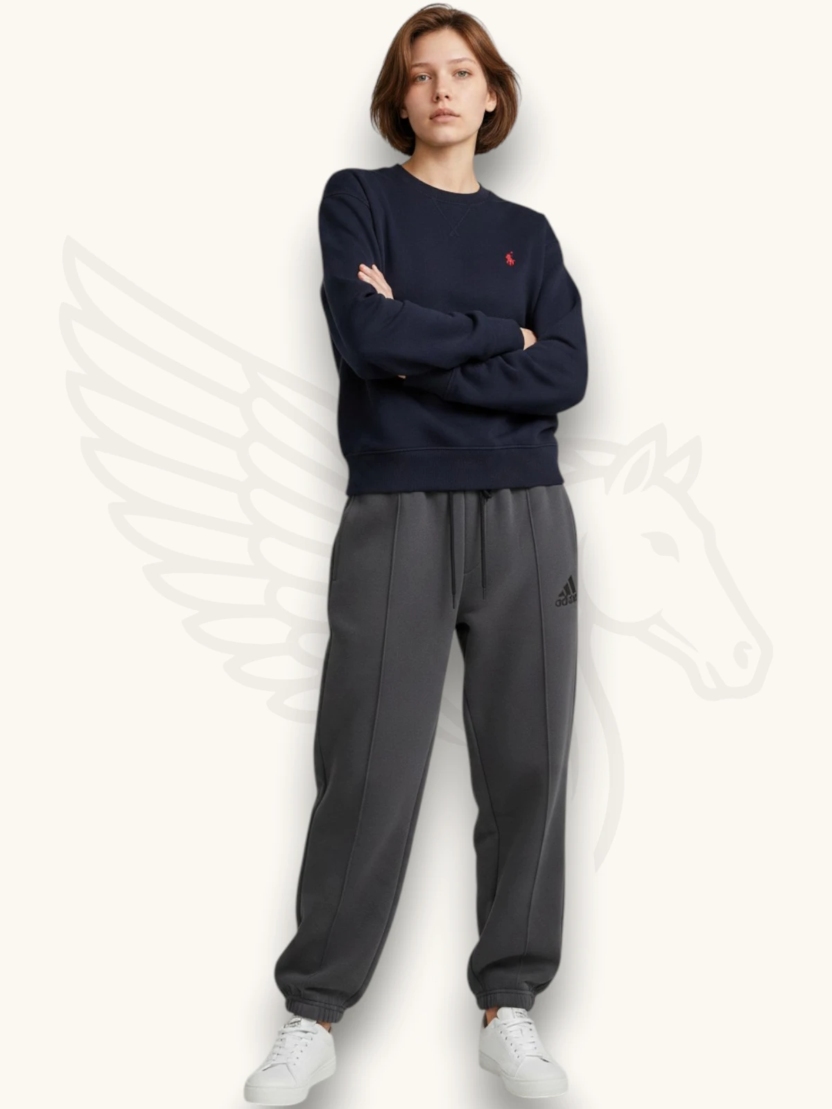 Navy blue sweatshirt and charcoal gray trouser tracksuit set on a female model, full outfit