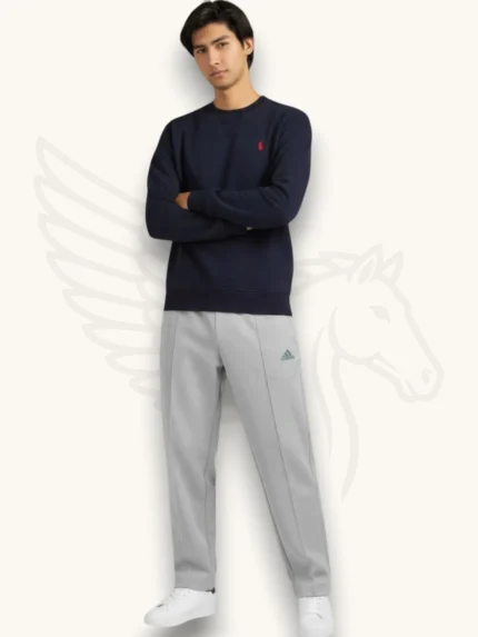Navy blue sweatshirt and light gray trouser tracksuit set on a male model, front view